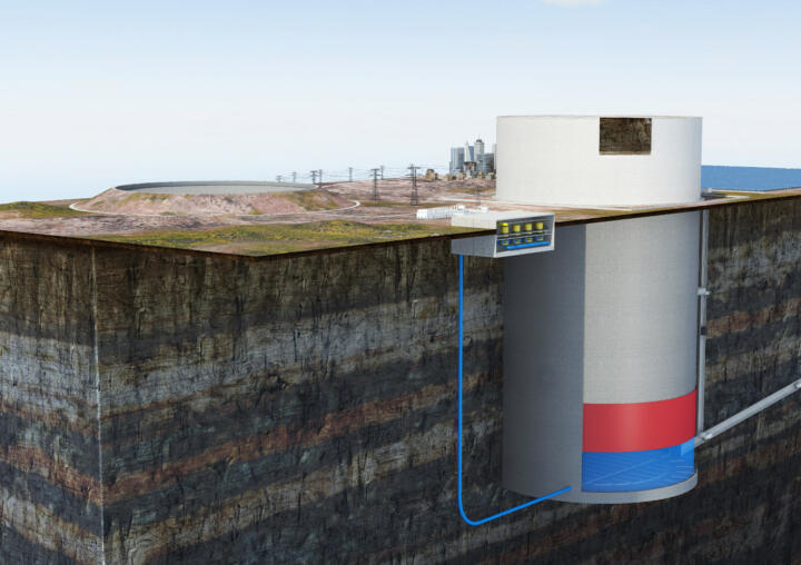 Surplus electricity is used to hydraulically pump a mass of rock.