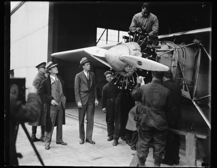 The 223-hp 9-cylinder Wright radial engine took Lindbergh (pictured at right, wi ...